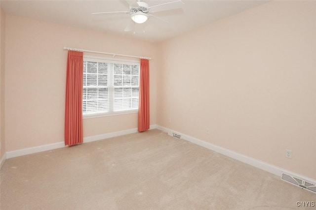 207 Falling Brook Path, Manlius, NY 13066 - spare room with a ceiling fan, light carpet, and baseboards