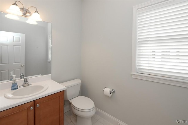 207 Falling Brook Path, Manlius, NY 13066 - bathroom with vanity, toilet, tile patterned flooring, and baseboards
