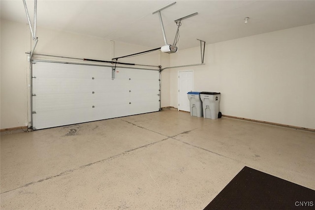 207 Falling Brook Path, Manlius, NY 13066 - garage with a garage door opener and baseboards