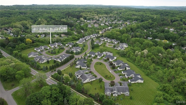 207 Falling Brook Path, Manlius, NY 13066 - aerial view of property and surrounding area featuring a heavily wooded area