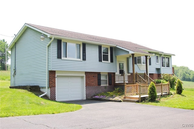 465 Blanding Rd, Sherburne, NY 13460 - split foyer home featuring an attached garage, a front yard, and driveway