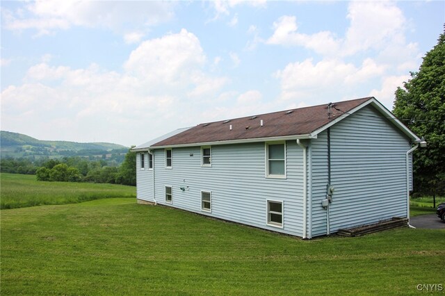 465 Blanding Rd, Sherburne, NY 13460 - back of house with a yard