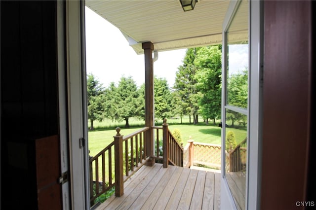465 Blanding Rd, Sherburne, NY 13460 - wooden deck featuring a lawn