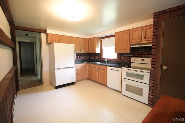 465 Blanding Rd, Sherburne, NY 13460 - kitchen featuring white appliances, light flooring, dark countertops, a sink, and under cabinet range hood