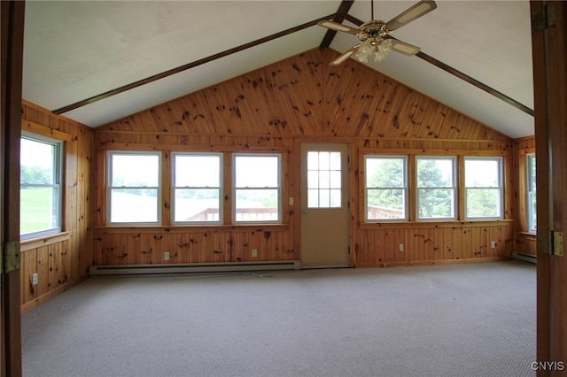 465 Blanding Rd, Sherburne, NY 13460 - unfurnished room with baseboard heating, plenty of natural light, vaulted ceiling, light colored carpet, and wood walls