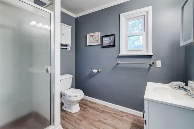 12 Edgewood Dr, Penfield, NY 14526 - bathroom with toilet, vanity, ornamental molding, a shower stall, and wood finished floors
