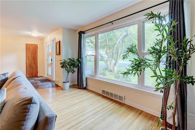 12 Edgewood Dr, Penfield, NY 14526 - living room featuring wood finished floors and baseboards