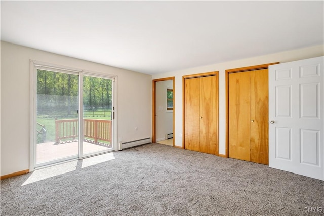 5750 Sentinel Heights Rd, Onondaga, NY 13078 - unfurnished bedroom with access to exterior, two closets, carpet, and baseboard heating