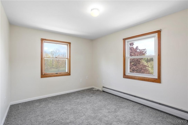 5750 Sentinel Heights Rd, Onondaga, NY 13078 - spare room featuring a baseboard radiator, healthy amount of natural light, carpet, and baseboards