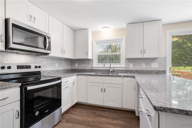 5750 Sentinel Heights Rd, Onondaga, NY 13078 - kitchen with stainless steel appliances, a sink, white cabinetry, and dark wood-style flooring