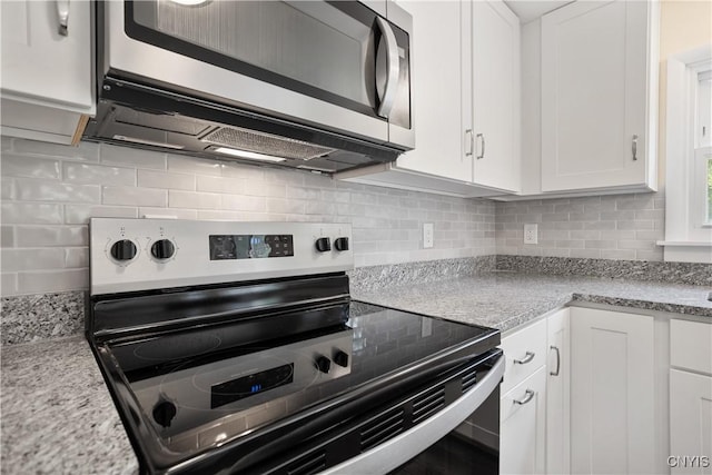 5750 Sentinel Heights Rd, Onondaga, NY 13078 - kitchen with appliances with stainless steel finishes, white cabinetry, and tasteful backsplash