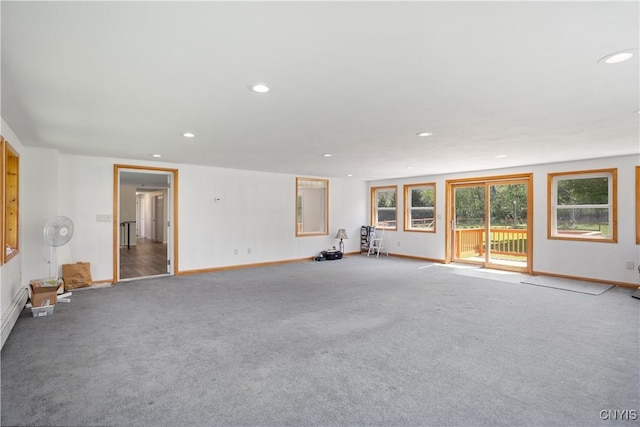 5750 Sentinel Heights Rd, Onondaga, NY 13078 - unfurnished living room with carpet floors, recessed lighting, and baseboards