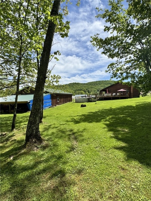 18 Memorial Dr, Otto Twp, PA 16729 - view of grassy yard with a pole building and an outbuilding