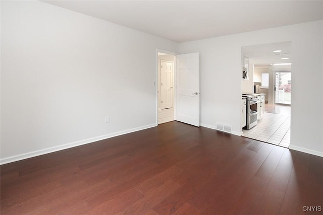442 Summerhaven Dr N, Manlius, NY 13057 - spare room with dark wood-style flooring and baseboards