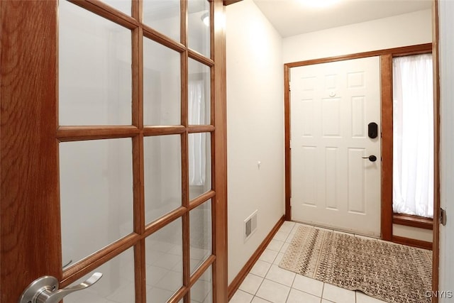 442 Summerhaven Dr N, Manlius, NY 13057 - entryway featuring light tile patterned floors and baseboards