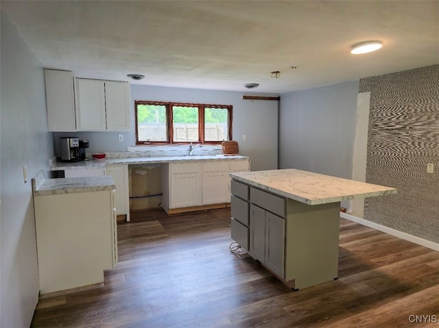 2484 State Route 31, Sullivan, NY 13032 - kitchen with dark wood-type flooring, a kitchen island, and white cabinets