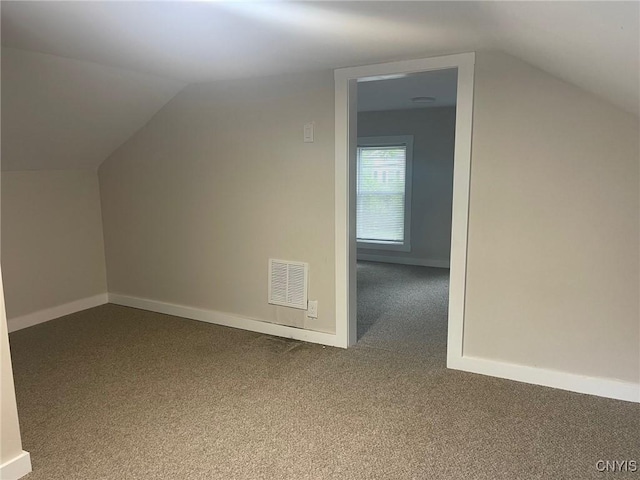 530 Lenox Ave, Oneida, NY 13421 - additional living space with carpet flooring and vaulted ceiling