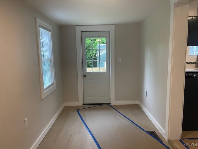 530 Lenox Ave, Oneida, NY 13421 - doorway to outside with baseboards