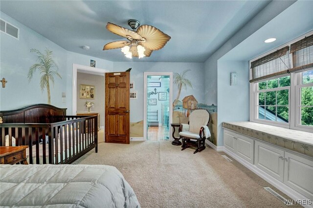 81 Hidden Oaks Ct, Grand Island, NY 14072 - bedroom with light colored carpet, baseboards, and a ceiling fan