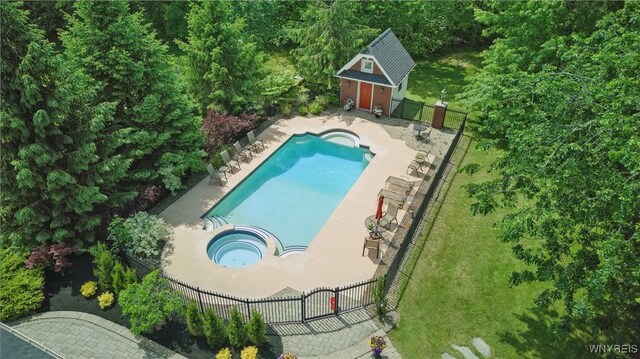 81 Hidden Oaks Ct, Grand Island, NY 14072 - view of swimming pool with a pool with connected hot tub and a patio