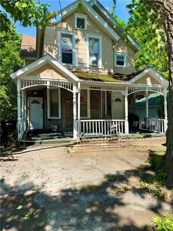 214-16 Reed Ave, Syracuse, NY 13207 - back of house featuring covered porch