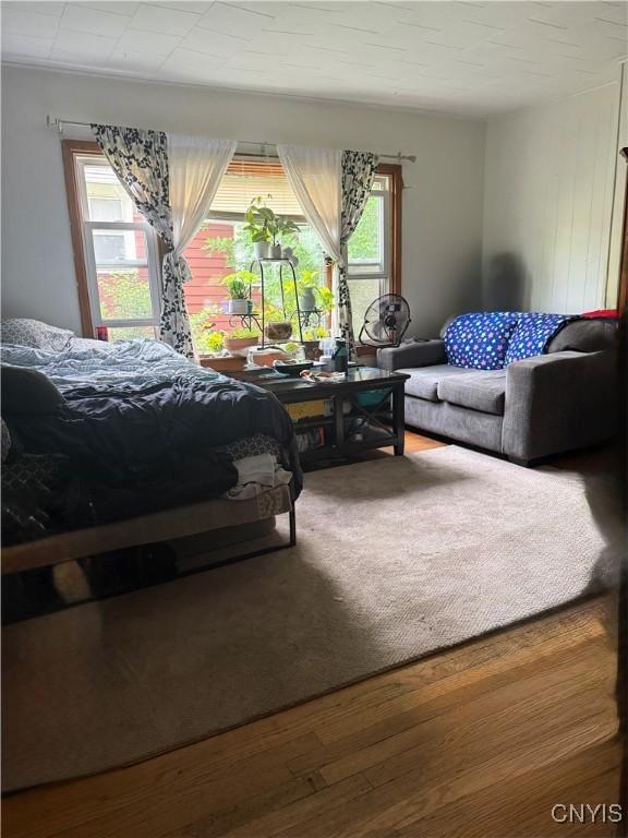 214-16 Reed Ave, Syracuse, NY 13207 - bedroom with multiple windows and wood finished floors