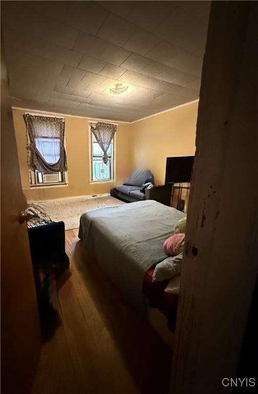 214-16 Reed Ave, Syracuse, NY 13207 - bedroom featuring wood finished floors