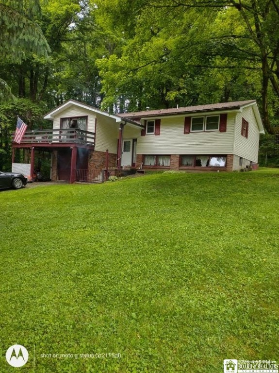 613 N Main St, Pine Grove Township, PA 16345 - view of front of property with a wooden deck and a front yard