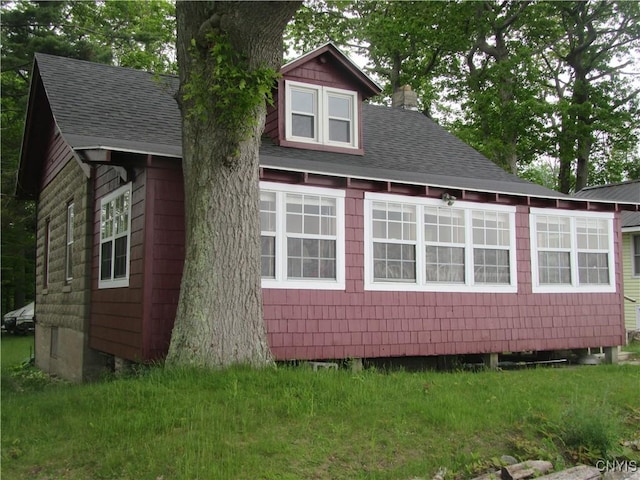 250 Pine Grove Rd Unit 3, Richland, NY 13142 - view of property exterior featuring a chimney and roof with shingles