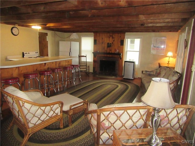 250 Pine Grove Rd Unit 3, Richland, NY 13142 - living area with a fireplace and beam ceiling