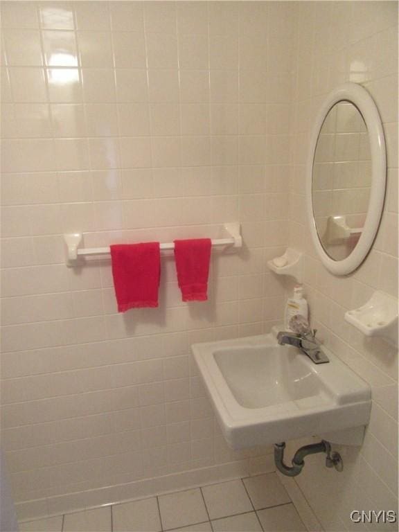250 Pine Grove Rd Unit 3, Richland, NY 13142 - bathroom with a sink, tile patterned flooring, and tile walls