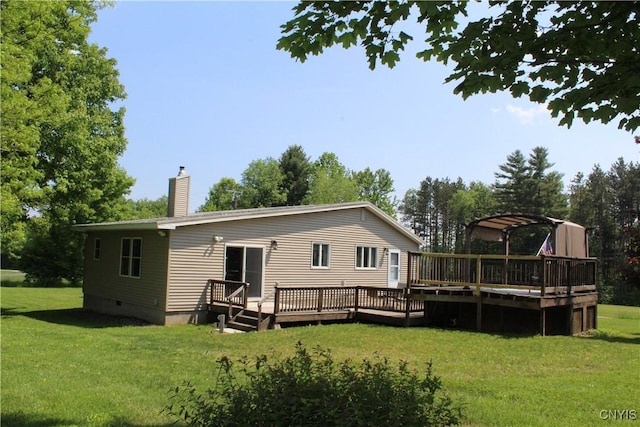 236 Harry Bryant Rd, Amboy, NY 13493 - back of property featuring a wooden deck, crawl space, a lawn, and a chimney