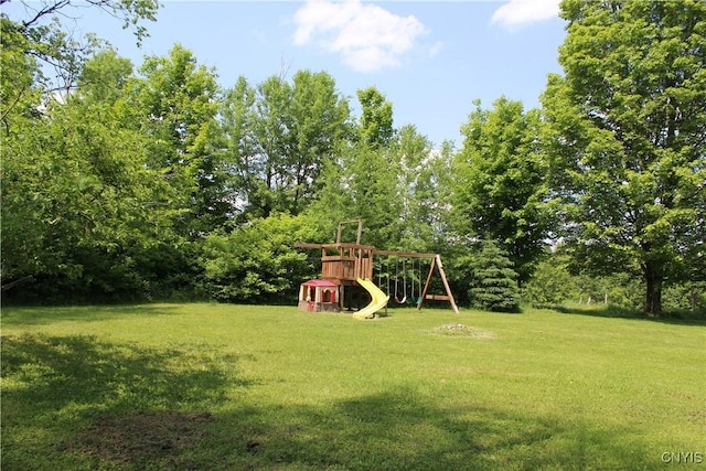 236 Harry Bryant Rd, Amboy, NY 13493 - view of grassy yard featuring a playground