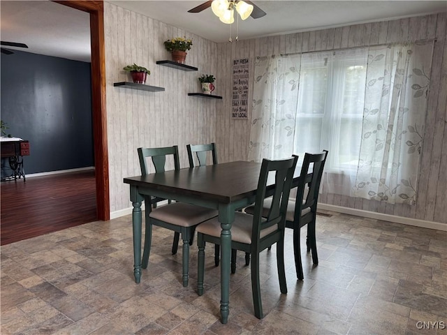 236 Harry Bryant Rd, Amboy, NY 13493 - dining room featuring ceiling fan, baseboards, and stone finish floors