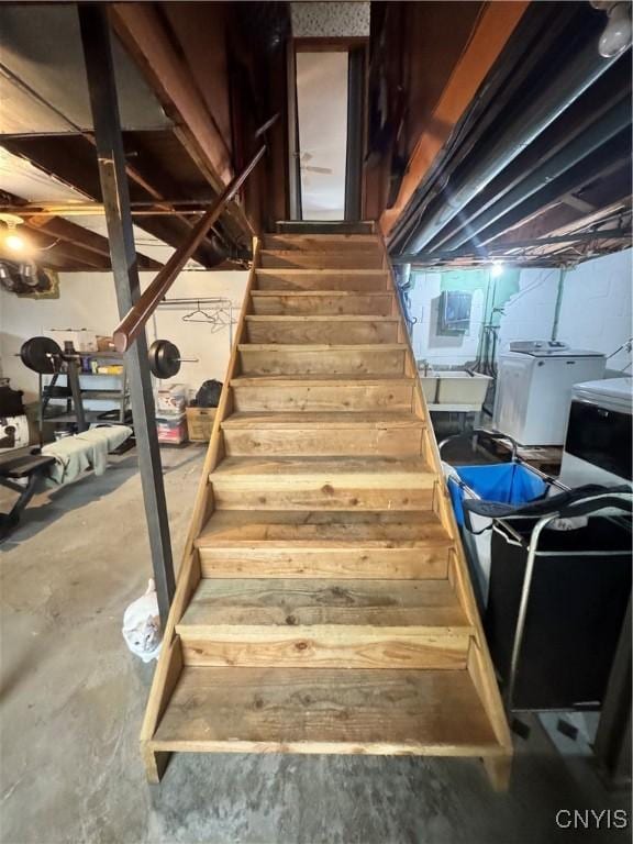 104 Lansdale Rd, Dewitt, NY 13057 - stairs with separate washer and dryer and unfinished concrete flooring