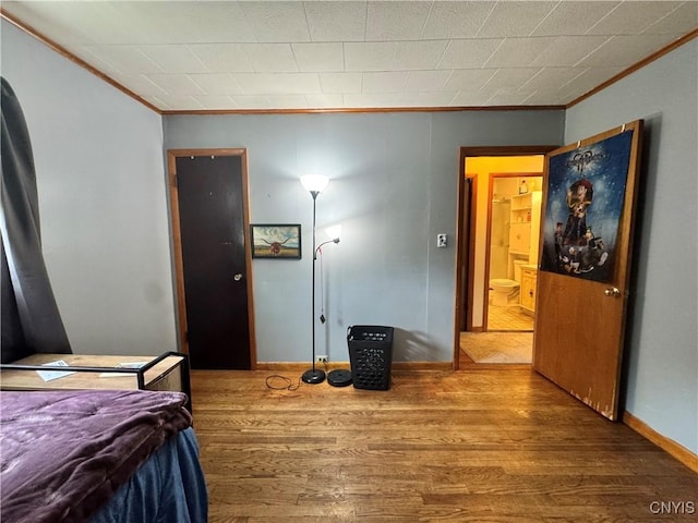 104 Lansdale Rd, Dewitt, NY 13057 - bedroom with crown molding and wood finished floors