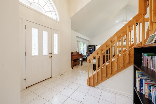 204 Red Hickory Dr, Greece, NY 14626 - foyer with tile patterned floors, high vaulted ceiling, and ceiling fan