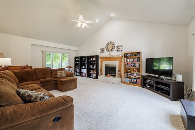 204 Red Hickory Dr, Greece, NY 14626 - carpeted living room with high vaulted ceiling, a tile fireplace, and a ceiling fan