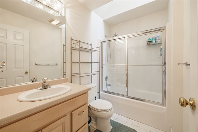 204 Red Hickory Dr, Greece, NY 14626 - full bathroom featuring vanity, toilet, tile patterned floors, and combined bath / shower with glass door