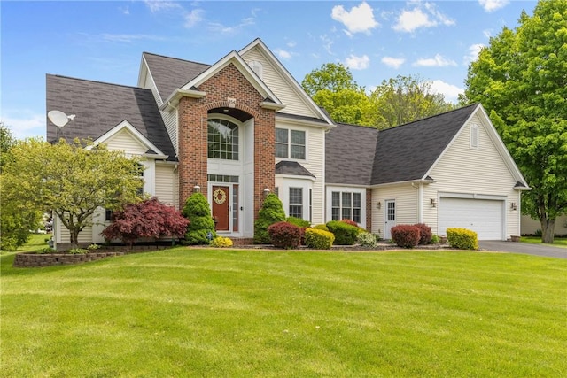 854 Park Haven Dr, Webster, NY 14580 - traditional-style house featuring asphalt driveway, a front lawn, an attached garage, and a shingled roof