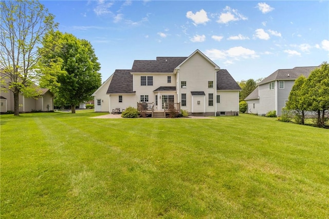 854 Park Haven Dr, Webster, NY 14580 - rear view of house with a lawn, a shingled roof, a patio, and a wooden deck