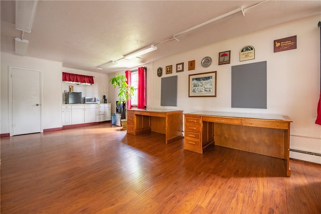 94 Main St, Stamford, NY 12167 - unfurnished office featuring wood finished floors and a baseboard radiator