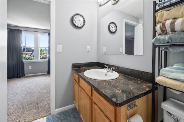 6121 Diffin Rd, Cicero, NY 13039 - bathroom featuring vanity, baseboards, and toilet