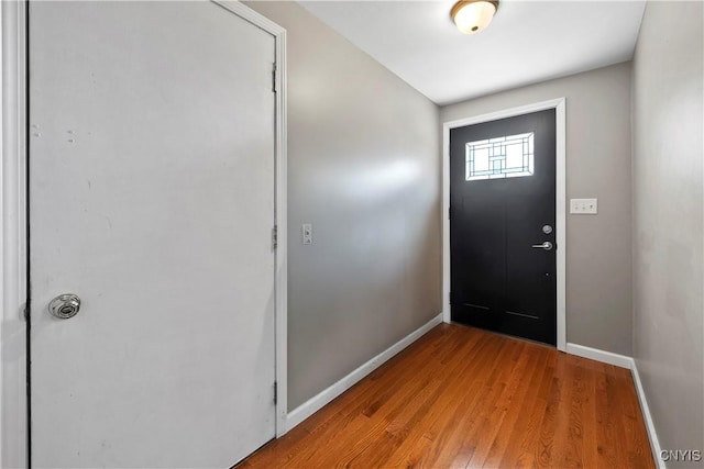6121 Diffin Rd, Cicero, NY 13039 - doorway featuring baseboards and light wood finished floors