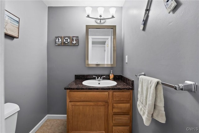 6121 Diffin Rd, Cicero, NY 13039 - half bath featuring toilet, vanity, and baseboards