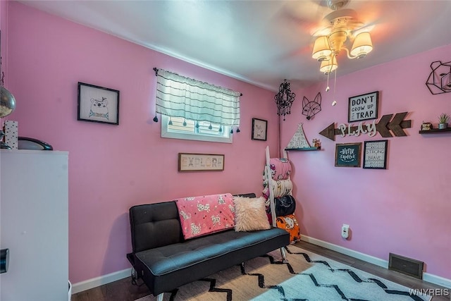 157 73rd St, Niagara Falls, NY 14304 - living area with a ceiling fan, wood finished floors, and baseboards