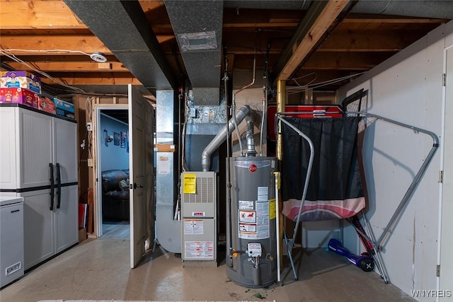157 73rd St, Niagara Falls, NY 14304 - unfinished below grade area featuring gas water heater and refrigerator