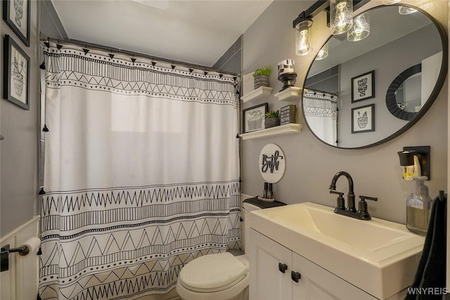 157 73rd St, Niagara Falls, NY 14304 - bathroom with vanity, toilet, and a shower with shower curtain