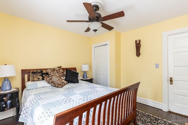 57 Savage Pl, Aurora, NY 14052 - bedroom with dark wood-style floors, baseboards, a closet, and ceiling fan
