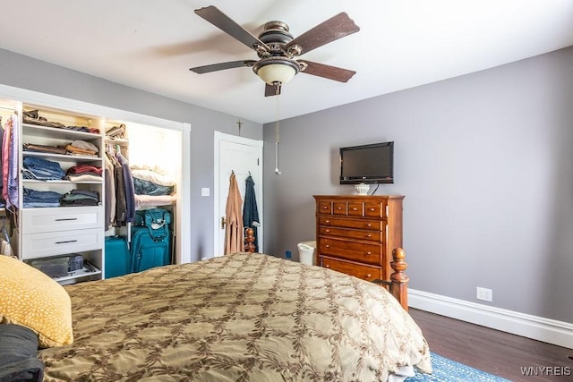57 Savage Pl, Aurora, NY 14052 - bedroom with wood finished floors, baseboards, a closet, and ceiling fan